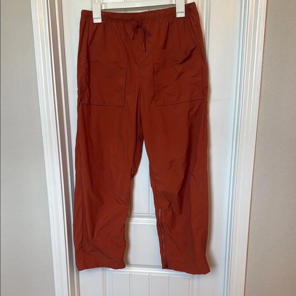 Free People Orange Track Pants with Tapered Fit - Picture 1 of 5